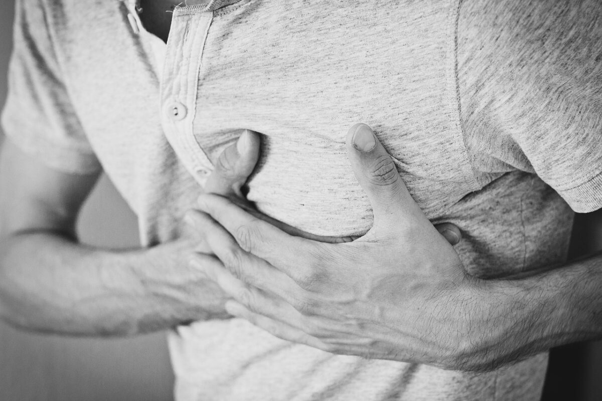 An image of a man having a heart attack